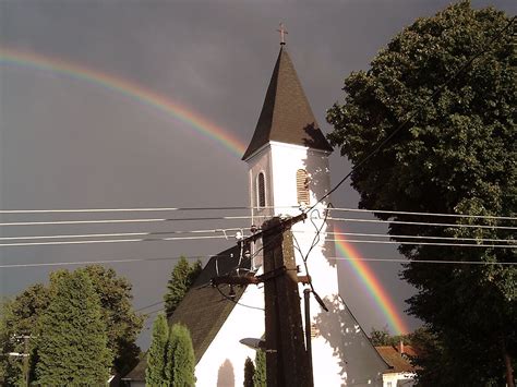 Rainbow In The Sky Behind The Church Rainbow Sky Over The Rainbow