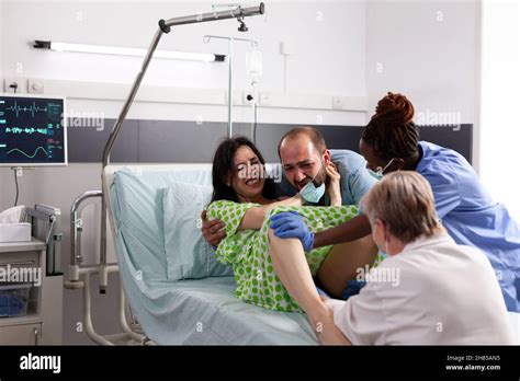 Pregnant Man Giving Birth To A Baby In Hospital