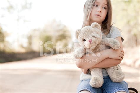 Sad Young Girl Hugging Old Raggedy Teddy Bear Stock Photo Royalty
