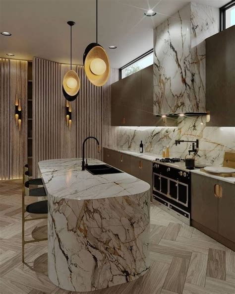 Kitchen With A Combination Of Marble And Some Gold Accents