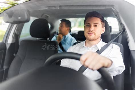 Male Driver Driving Car With Passenger Stock Image Image Of Driver