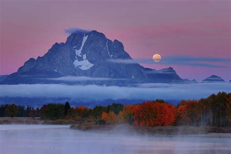 Moonset During Sunrise At Mount Moran During Autumn Photograph By