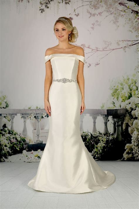 This Off The Shoulder Mikado Gown Has A Fishtail Skirt And Delicate