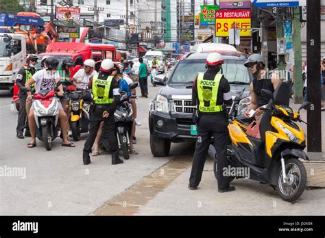 Police In Patong Phuket Thailand Stopping Foreign Tourists To Check For International Driving