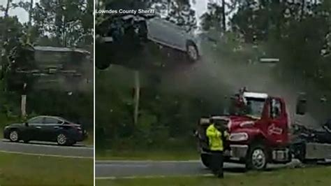 Video Car Flies Airborne Off Back Of Tow Truck In Shocking Georgia Crash Driver Survives