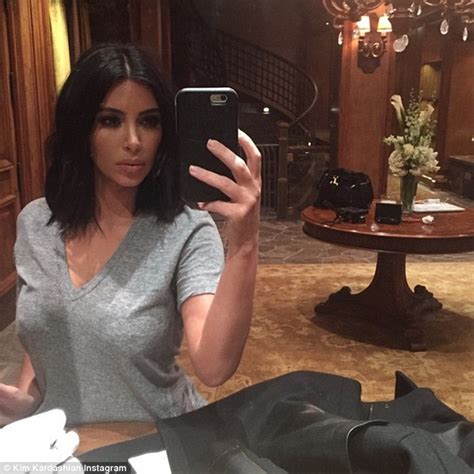 Kim Kardashian Shares Sultry Selfie Before Serving Up Cake To Jonathan