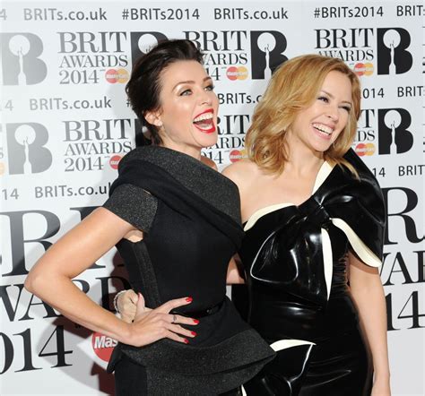 Kylie and dannii minogue duet 100 degrees live on xf au. Kylie Minogue and Dannii Minogue - 2014 Brit Awards ...