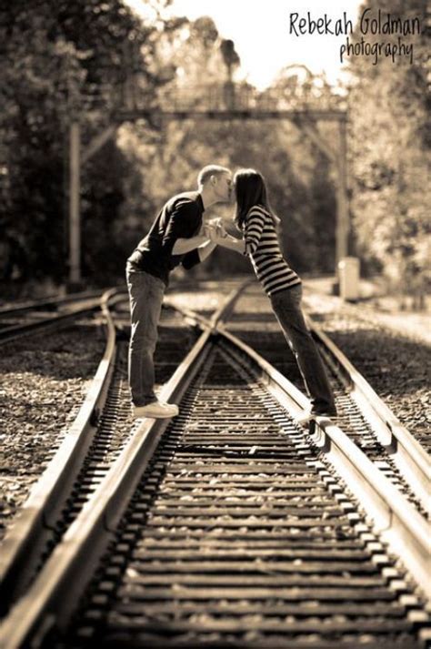 Couple Kissing On Train Tracks Rebekah Goldman Photography Couplephotography Couple Photog