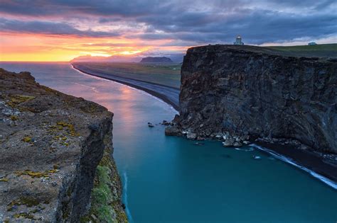The Lighthouse Of Dyrholaey Near Vik S Iceland At Sunset Photo By