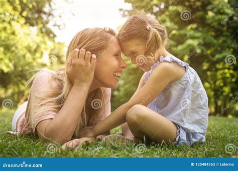 Mother And Daughter Sitting Together On Green Grass Mother And Stock Image Image Of Girl
