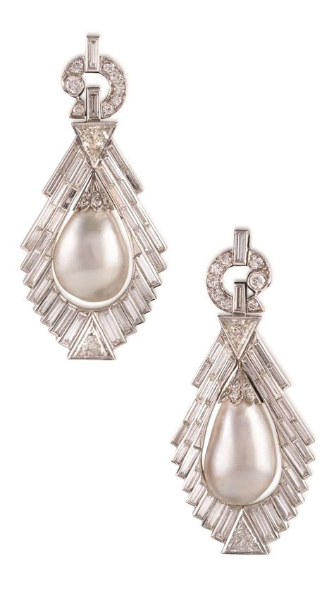 Important Pair Of Natural Pearls Set In Art Deco Diamond Pendent