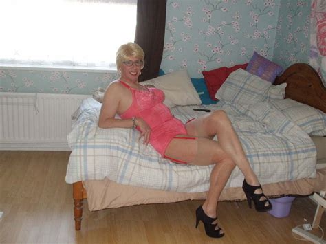 Miss Moorcock Loves To Expose Herself At Home In Her Pink Corselette Photo 2