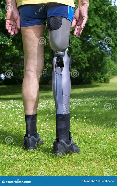 Rear View On False Leg Of Man Standing On Grass Stock Image Image Of