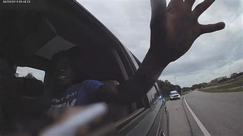 Dramatic Body Camera Video Shows Florida Cop Being Dragged By Suspects