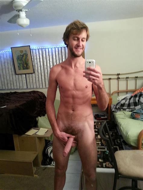 Smiling Stud Holds His Large Cock Nude Men Pictures
