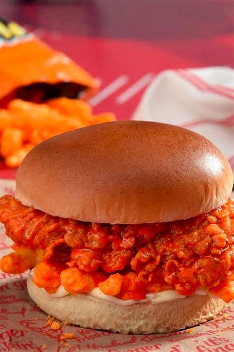 Kfcs Outrageous Fried Chicken Sandwich With Cheetos And Cheese Sauce