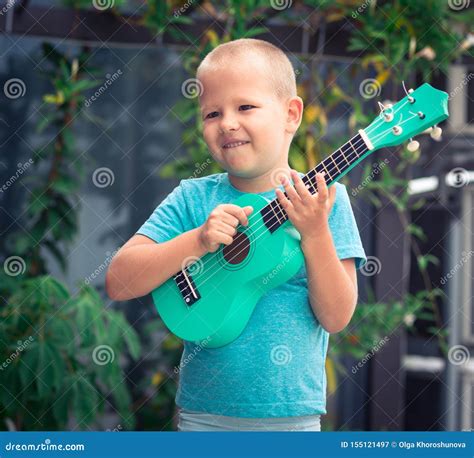 Portrait Of A Cute Boy With Ukulele Stock Image Image Of Music
