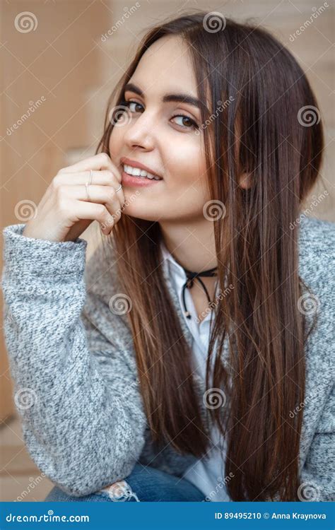 Portrait Of Smiling Caucasian Brunette Young Beautiful Girl Woman Model