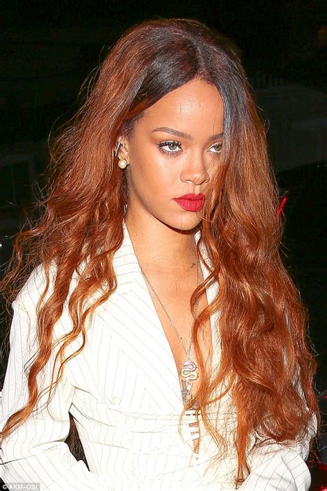 Rihanna Showcases Her Fabulous Toned Curves In Stripy Plunging Shirt Daily Mail Online