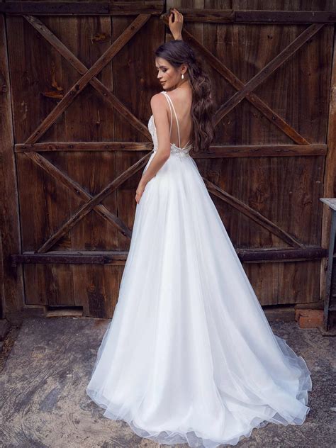 Modern Wedding Dress With Floral Applique And Low Back
