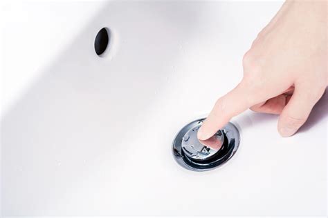 For another temporary fix, you can use a plastic sandwich zip lock bag to act as the seal behind the plug so the sink holds water. How to Fix a Pop-Up Drain Stopper: Step-by-Step Guide ...