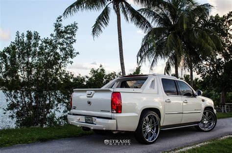 Stylish Presence Of Custom White Cadillac Escalade Fitted With Chrome