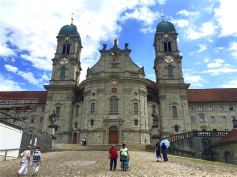 ˈaɪnziːdl̩n) is a municipality and district in the canton of schwyz in switzerland known for its monastery, the benedictine einsiedeln abbey, established in the 10th century. Einsiedeln Abbey - The iconic Benedictine Monastery with ...