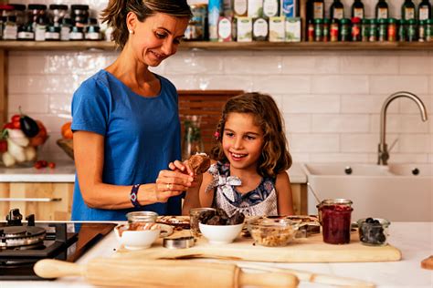 Check spelling or type a new query. Little Girl Cooking With Her Mother In The Kitchen Stock ...