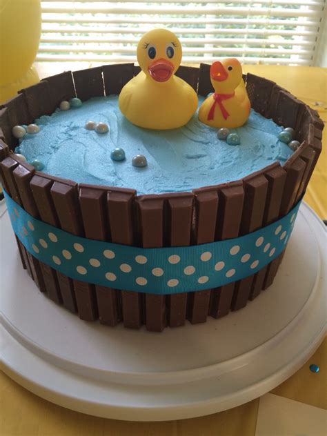 I hosted a baby shower for my sister last weekend. Rubber duck kit kat cake. Two-layer yellow cake inside ...