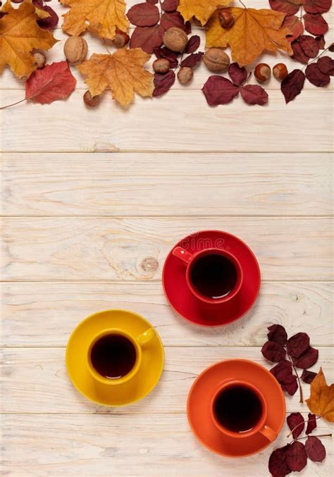 Fall Concept Cups Of Coffee Pears And Autumn Leaves On A Light Stock