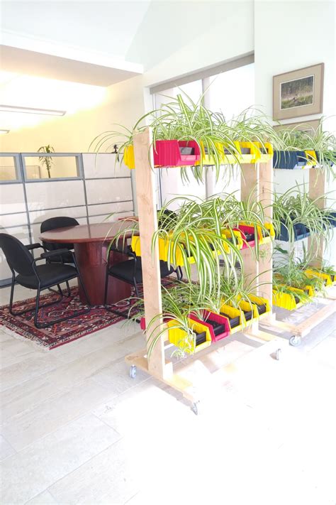 Vertical Mobile Planter Has 30 Plant Bins On 2 Sides Office Lobby