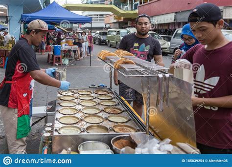 Selling food from heart and home. Food Vendor Selling Those Delicious And Colorful Malaysian ...