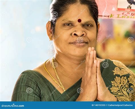 Mature Woman With Hands Clasped In Prayer Editorial Image Image Of