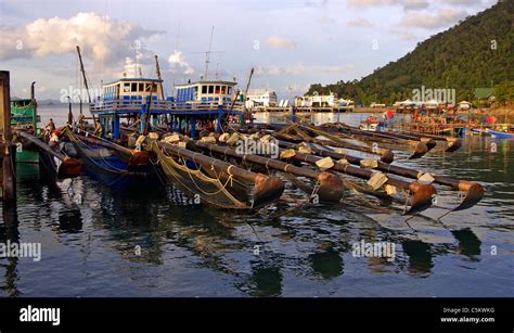 Fishing Boat And The Main Ferry Port At Sunset Koh Chang Island Thailand Stock Photo Alamy
