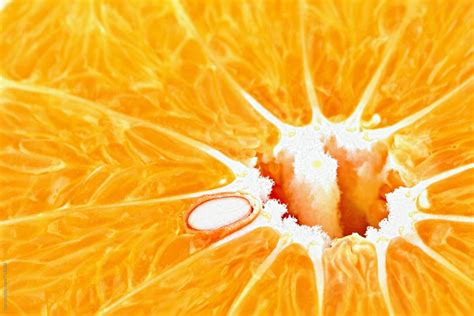 Orange Slice Fruit Closeup Macro By Stocksy Contributor Ilya Stocksy