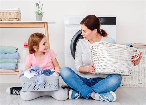 Little Girl Helping Mother During Washing Stock Photo Image Of Liquid