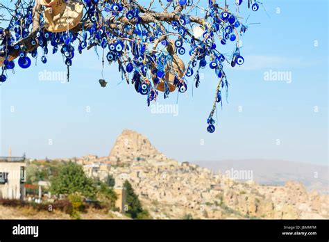 Nazars Turkish Evil Eye Charms On The Branches Of Tree On Uchisar
