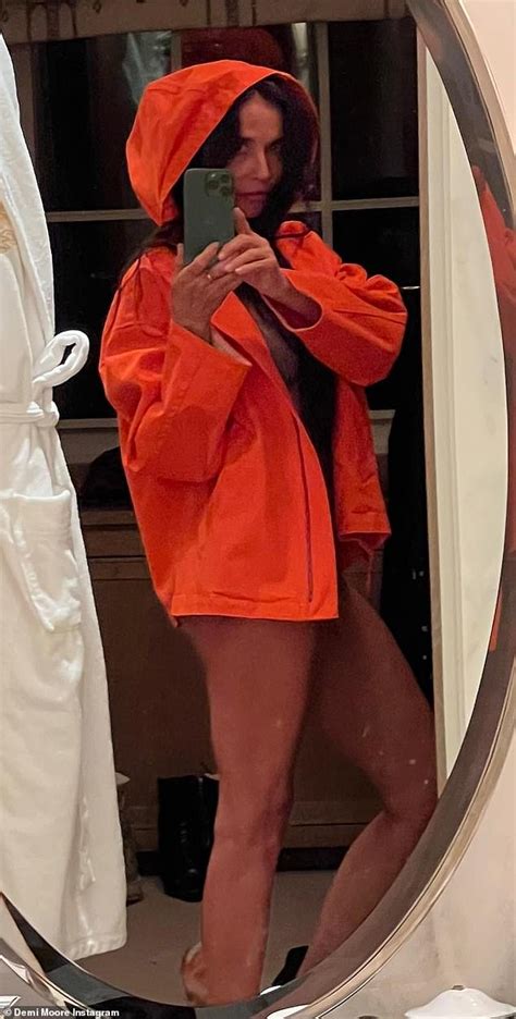 Demi Moore Strips Down And Shows Off Amazingly Toned Legs In Orange Hoodie Jacket Ahead Of Her