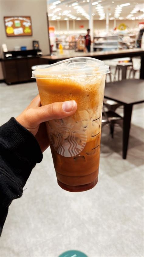 Starbucks Venti Iced Toasted Vanilla Oat Milk Shaken Espresso Coffee
