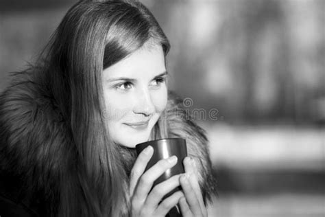 Young Girl Holding Cup Of Coffee In Winter Park Stock Photo Image Of