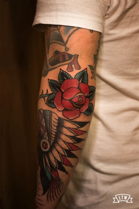 Traditional Rose Tattooed On The Elbow By Dennis