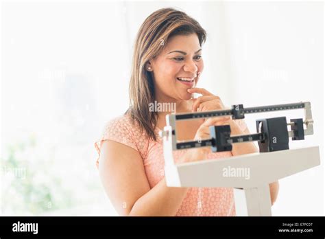 Caucasian Woman Standing On Scale Hi Res Stock Photography And Images