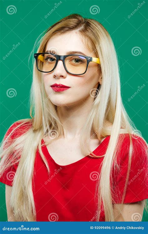 Wonderful Portrait Of Cute Smart Girl In Eyeglasses And Red Top Studio