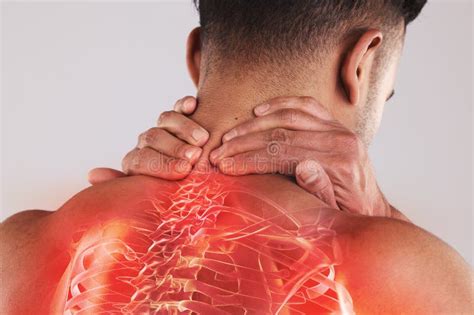 Man With A Spinal Injury Pain Or Accident With Backache Holding His