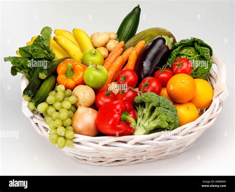 Basket Of Fresh Fruit And Vegetables Cut Out Stock Photo 13629920 Alamy