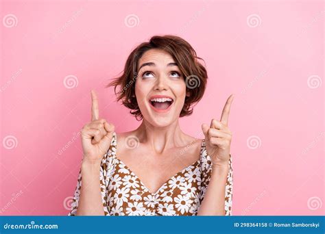 Photo Of Astonished Pretty Girl Open Mouth Look Indicate Fingers Up