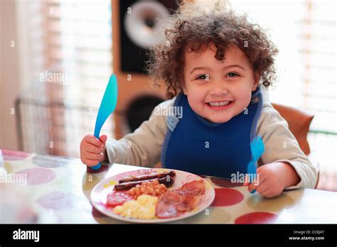 Toddler Eating Fry Up Breakfast Hi Res Stock Photography And Images Alamy