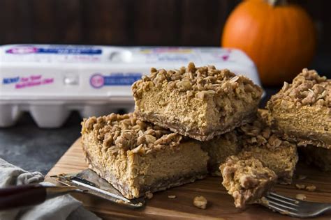Specifically with a toasted pecan/graham cracker crust and a dollop of fresh whipped cream on top. Streusel-Topped Pumpkin Cheesecake Bars • The Crumby Kitchen