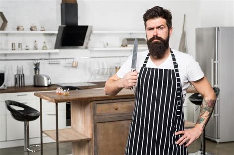 Premium Photo Ready To Cut Serious And Confident Chef In Cafe Use Knife Tasty Cuisine Bearded