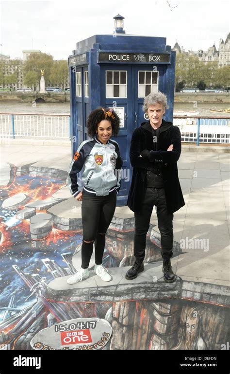 Peter Capaldi In Costume As Doctor Who And Pearl Mackie As His New